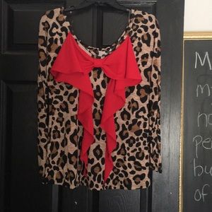 Unique leopard print with red bow top! Size large